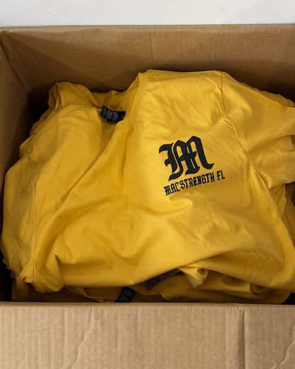 Real order: gold tees with a black left chest print for a local gym