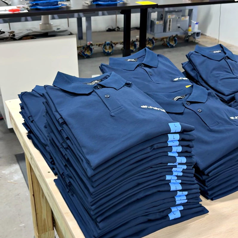 Company polos, folded and ready