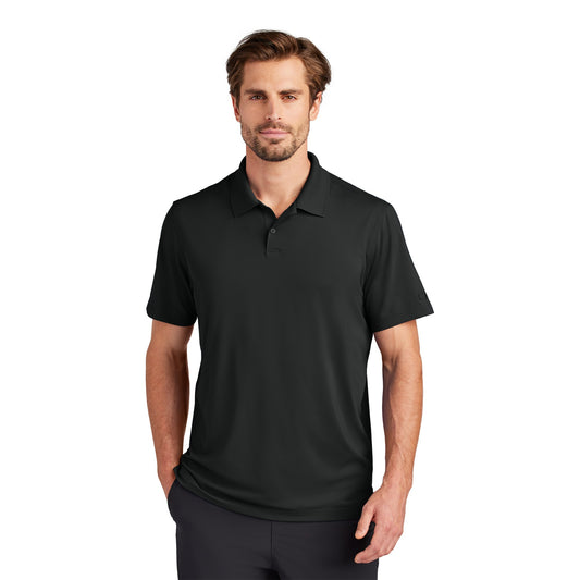 Man wearing a black (Blacktop) OGIO OG170 Regain polo, front view