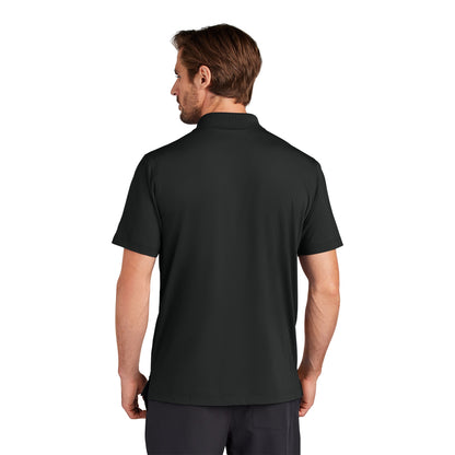 Man wearing a black (Blacktop) OGIO OG170 Regain polo, back view
