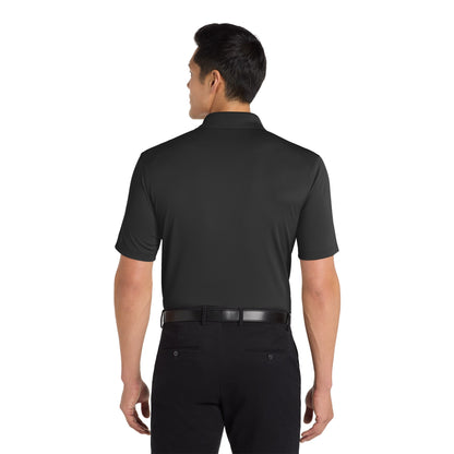 Man wearing a black Port Authority K110 Dry Zone micro-mesh polo, back view