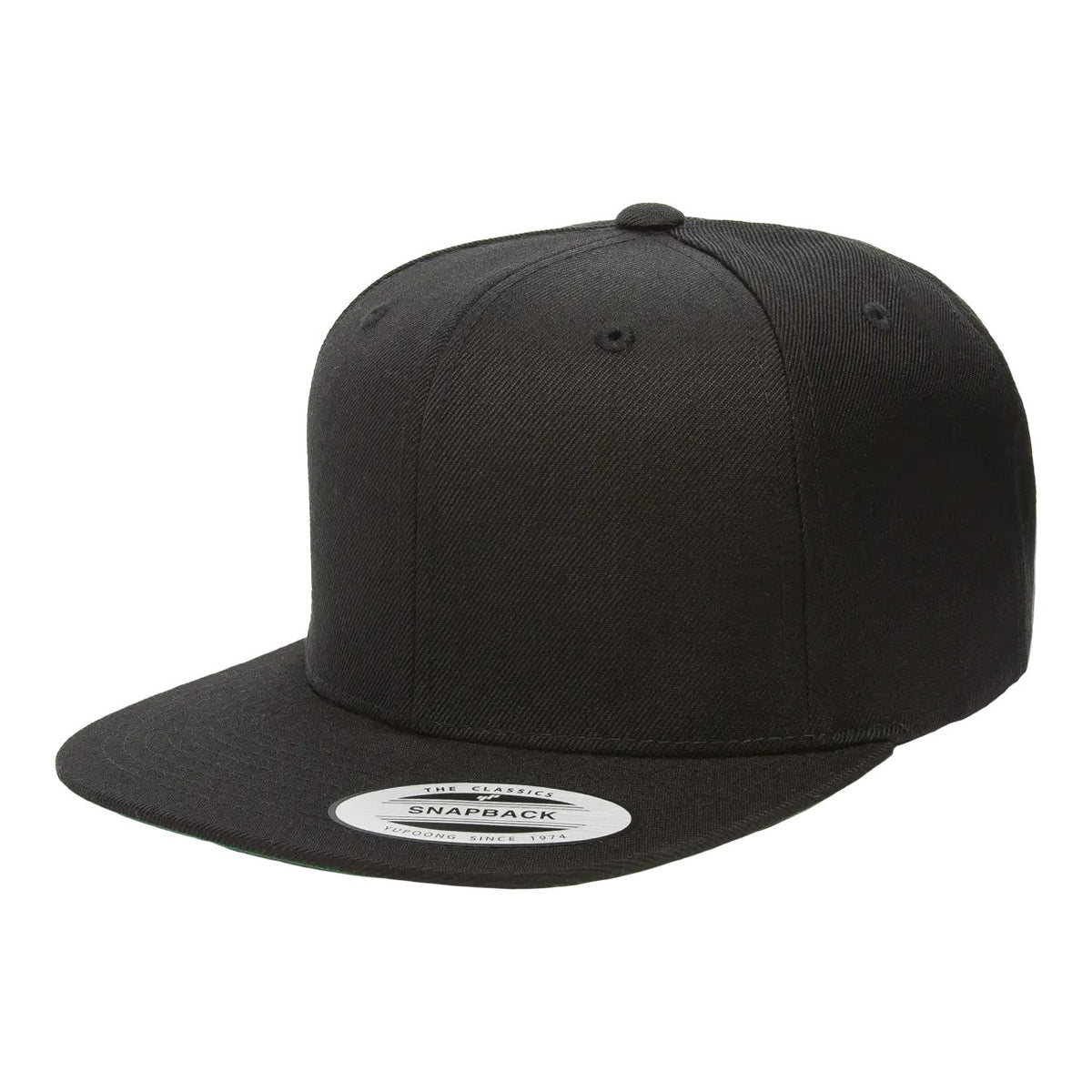 Black Yupoong YP Classics 6089M flat bill snapback cap, blank, three-quarter front-left view showing the flat bill