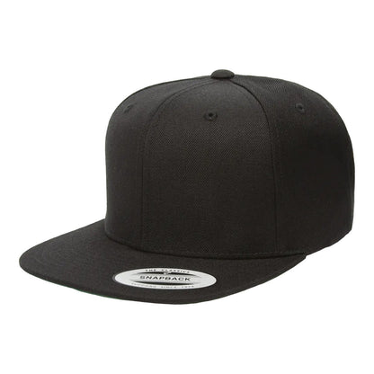 Black Yupoong YP Classics 6089M flat bill snapback cap, blank, three-quarter front-left view showing the flat bill